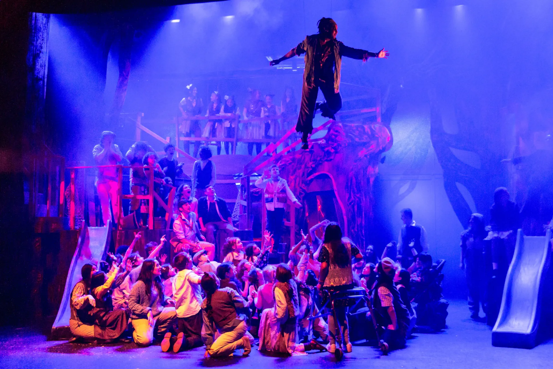 Pan flies above cast