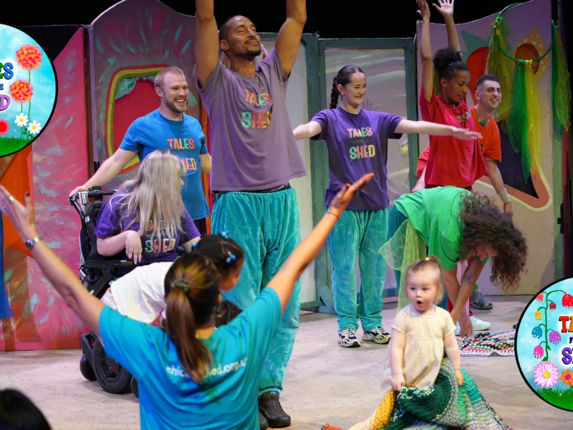 tales from the shed show with the children arms up