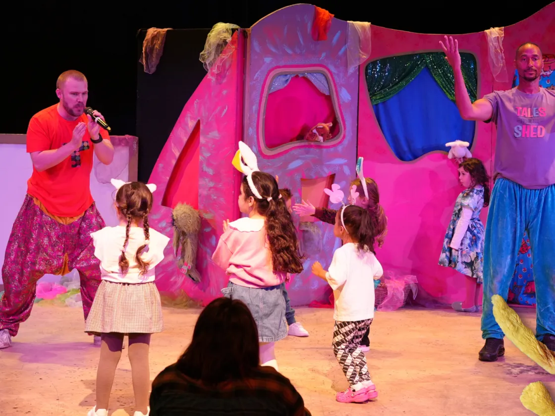 children dancing with bunny ears