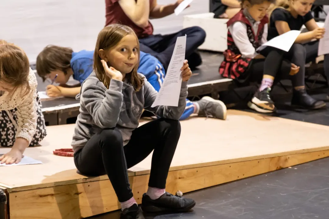 young girl reads script in workshop