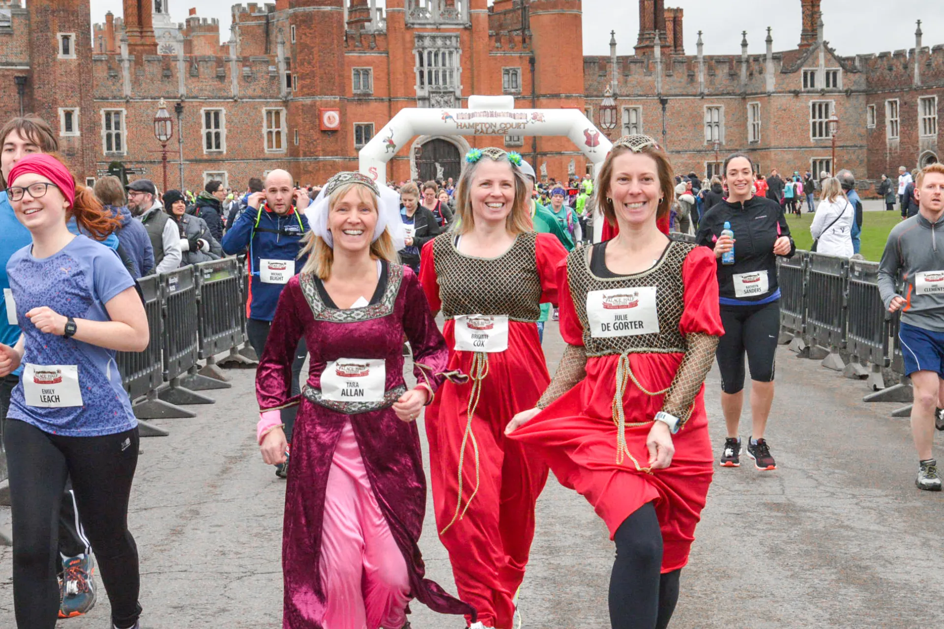 three runners in costume at the beginning of the Hampton Court Palace half marathon
