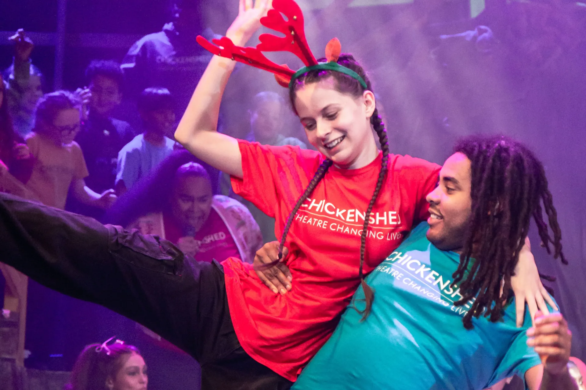 two people doing a lift and smiling