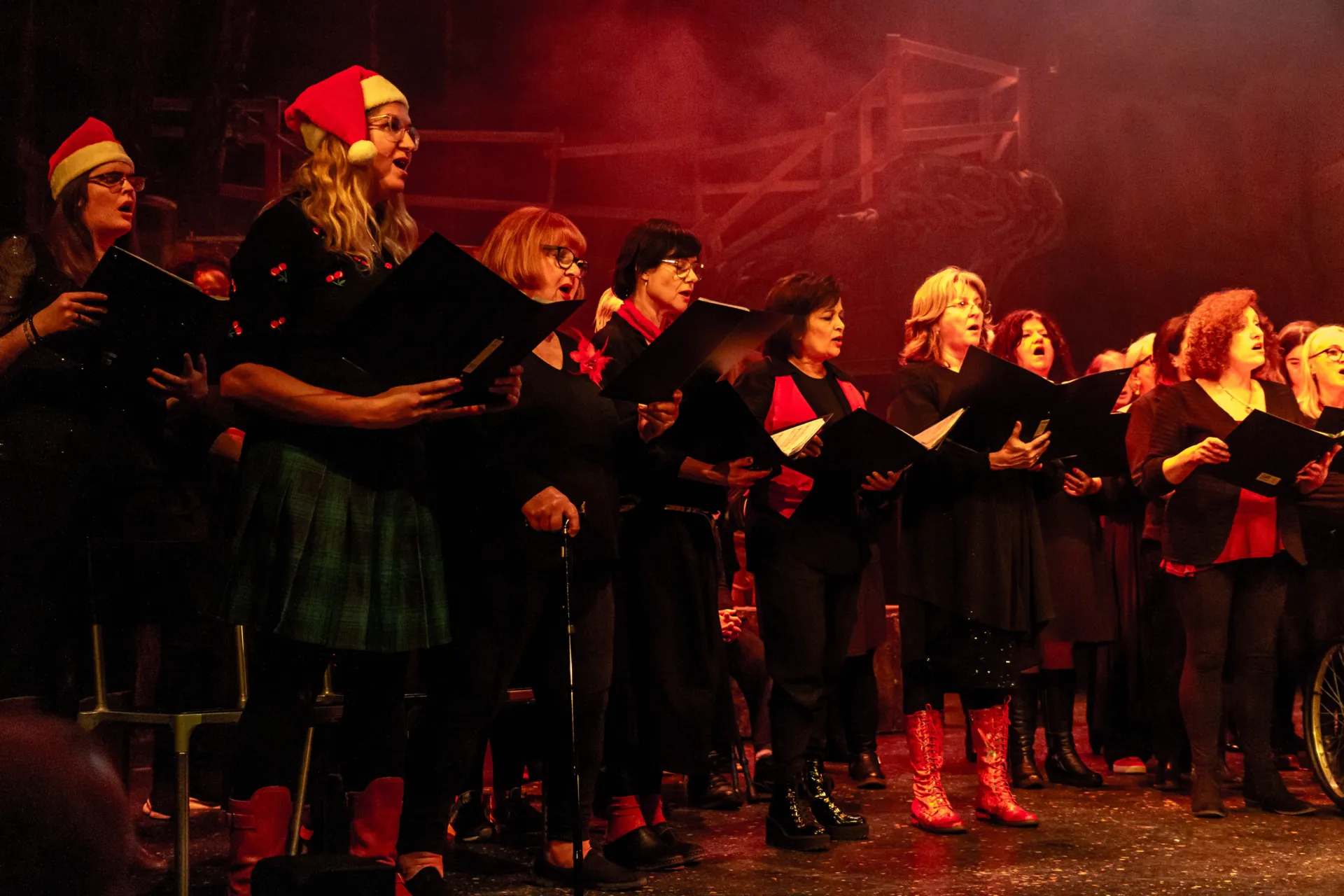 Choir singing in santa hats
