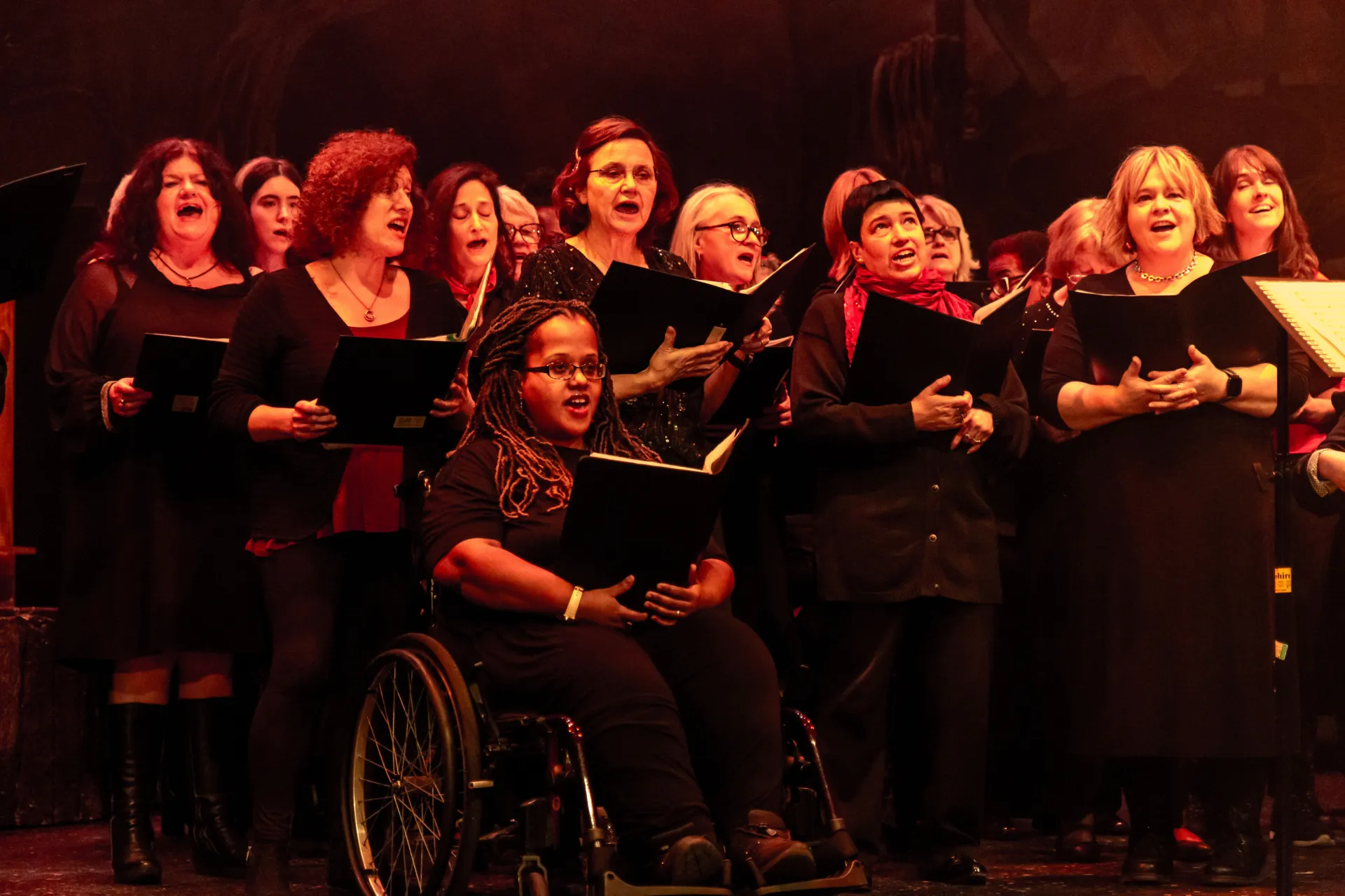Choir singing in santa hats