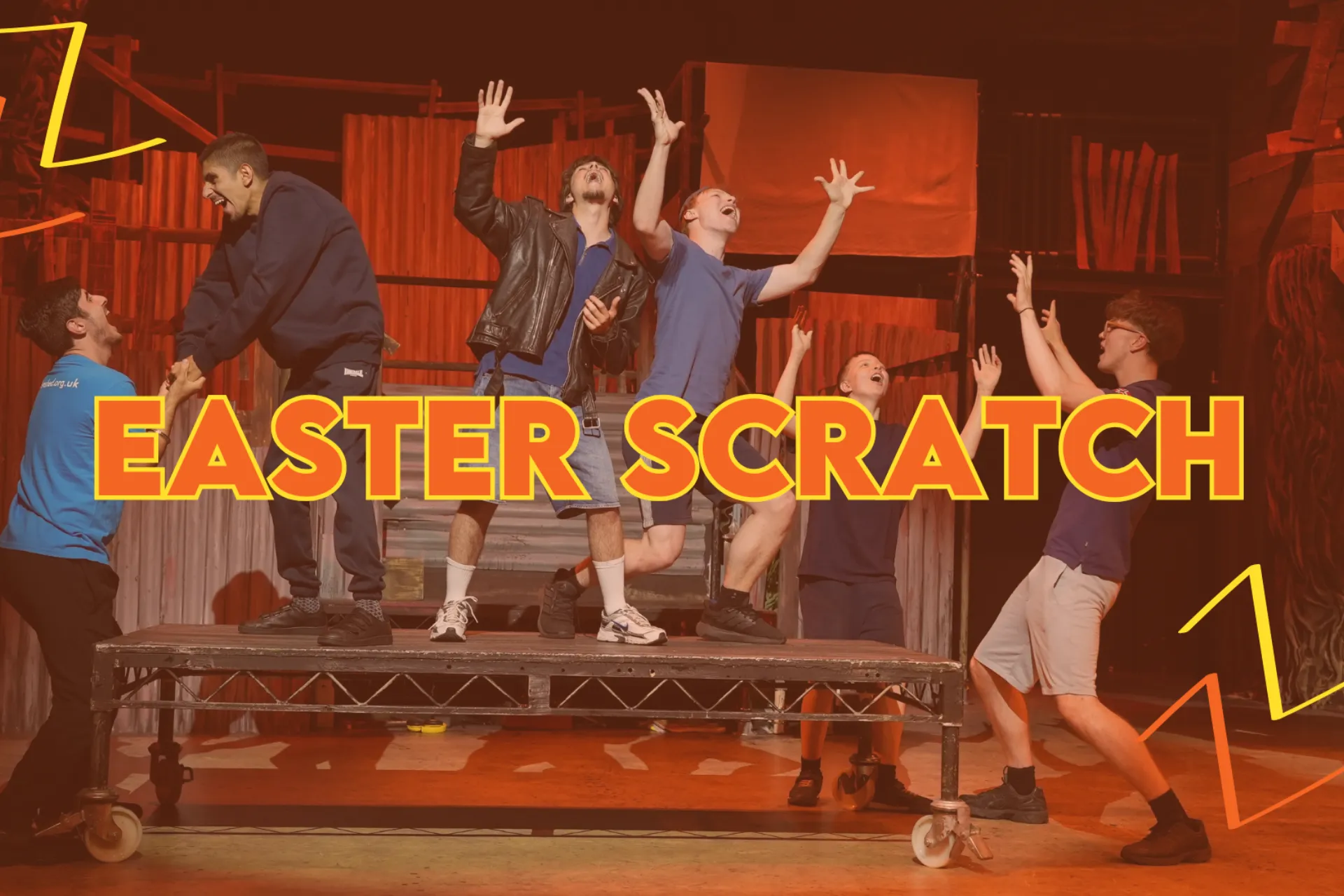 Easter Scratch Here. Group of young performers on stage in different energetic positions